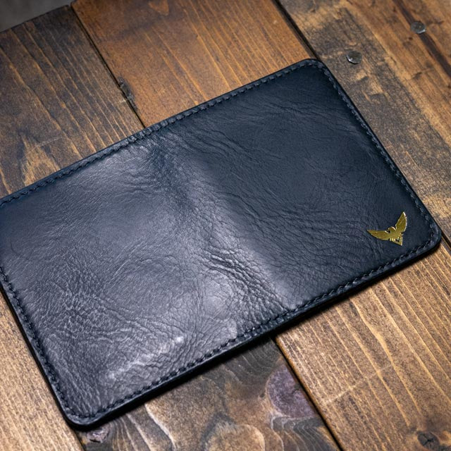 The Bran Vertical Wallet - Black Wax Pull-Up